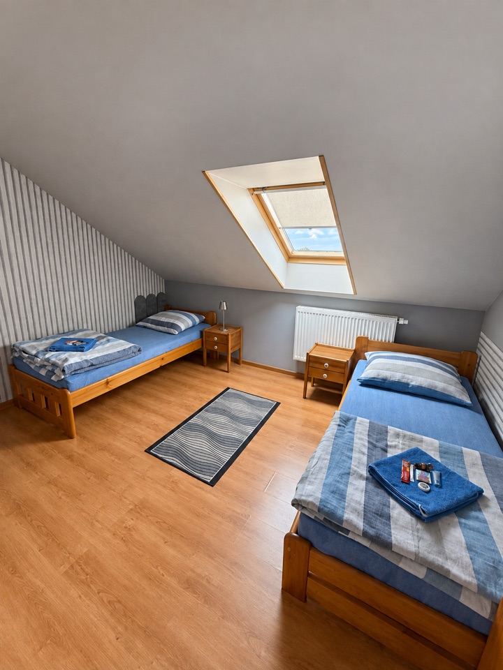 Pokój 6 · 2 łóżka — widok pokoju